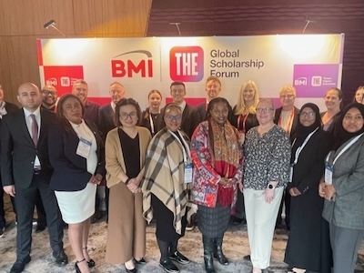 Isa with counselors and advisors at Global Scholarship Forum