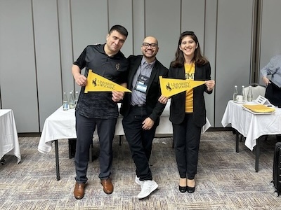Daing with students Murodullo Bazarov and Markhoba Saidova 