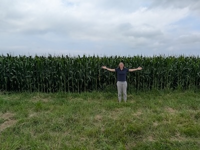 Margaret standing in front of corn