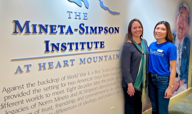 Haruka Takaku and Aura Newlin in front of the Mineta-Simpson Institute sign