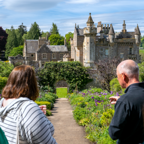 Gardner giving a tour of Abbotsford garden