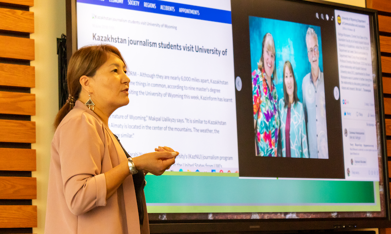 Karlyga Myssayeva giving a presentation