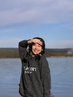 Bettie smiling into the sun in Yellowstone National Park