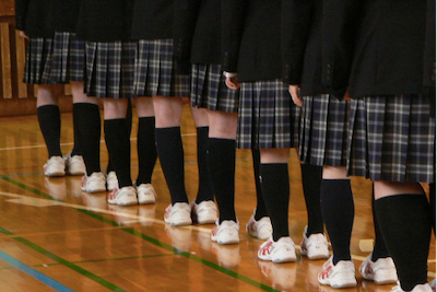 photo of student uniforms, socks and shoes