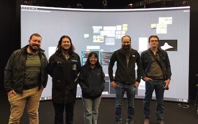 five people in front of screen in 3D Visualization Center
