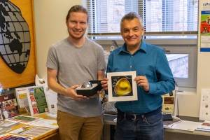Cedar Wiseman and Dr. Tamás Novák with the gömböc