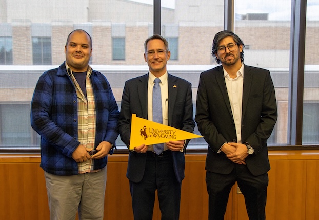 Two UW students with ambassador