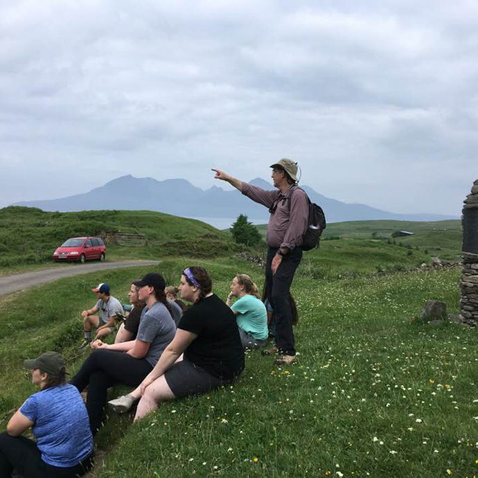 A professor points to an interesting sight during a UW in Scotland program.