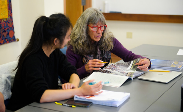 Teacher and student in a classroom