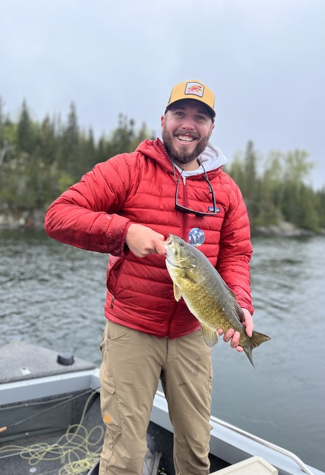 Picture of Chris Phillips holding a fish