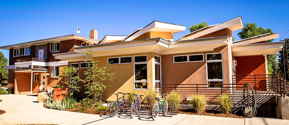 Kendall House from the back courtyard with bikes