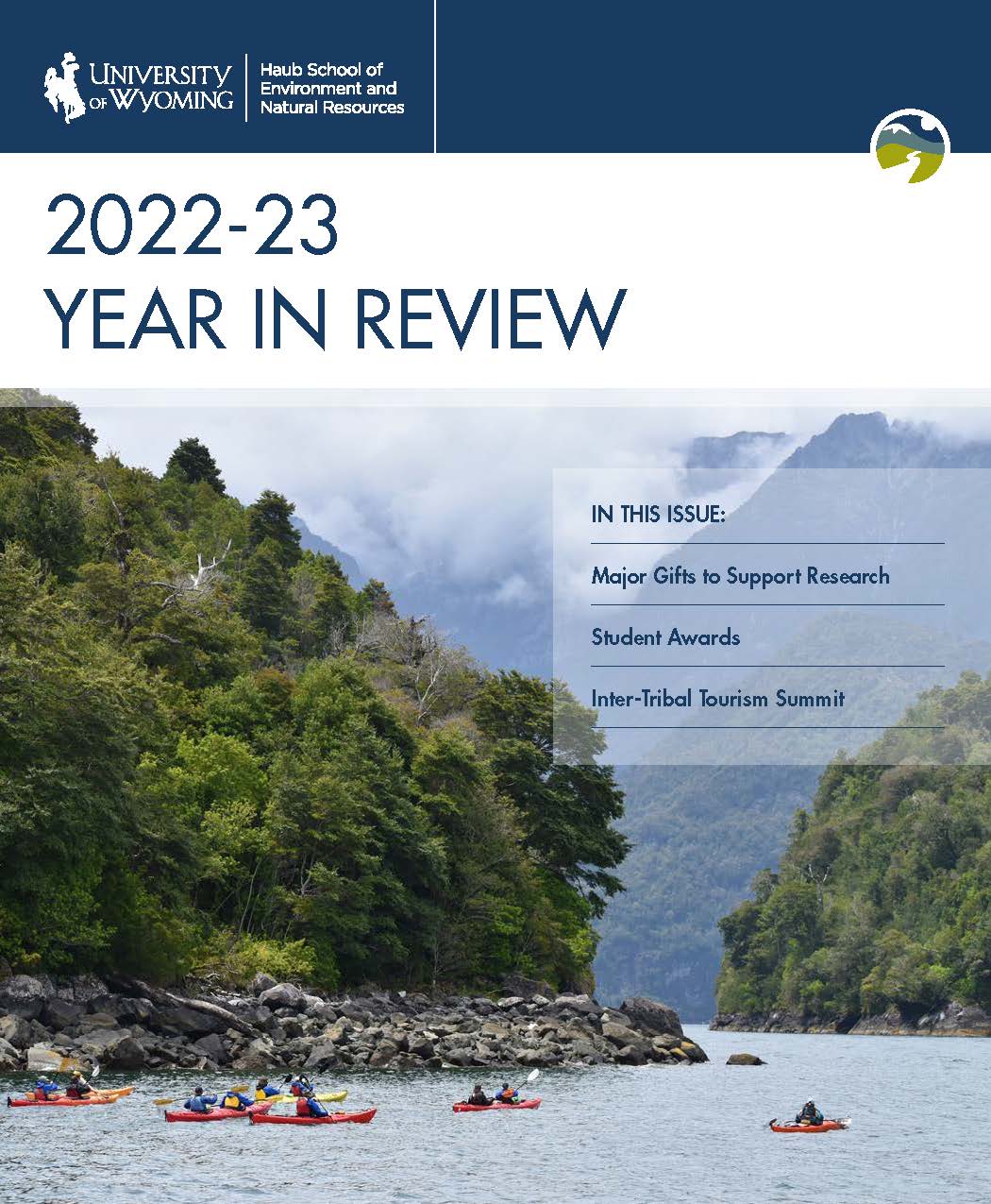Cover of Haub School Year in Review with photo of students kayaking a fjord
