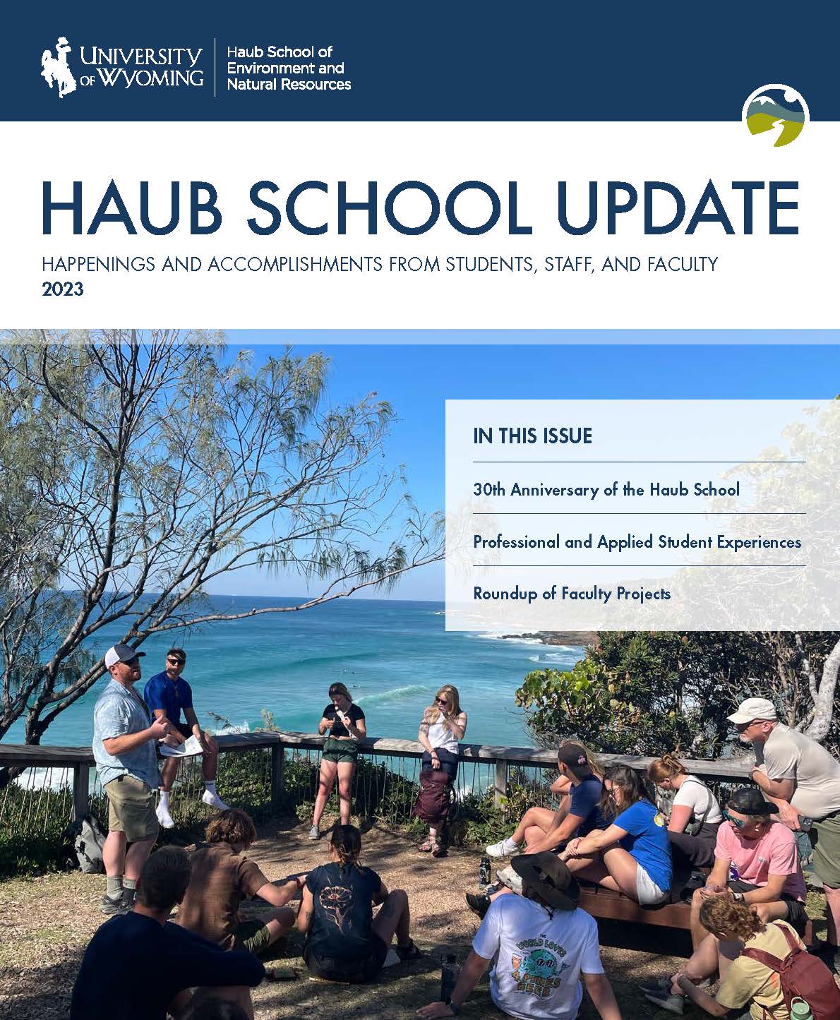 Cover of 2023 update with photo of a group of students having a discussion near the ocean