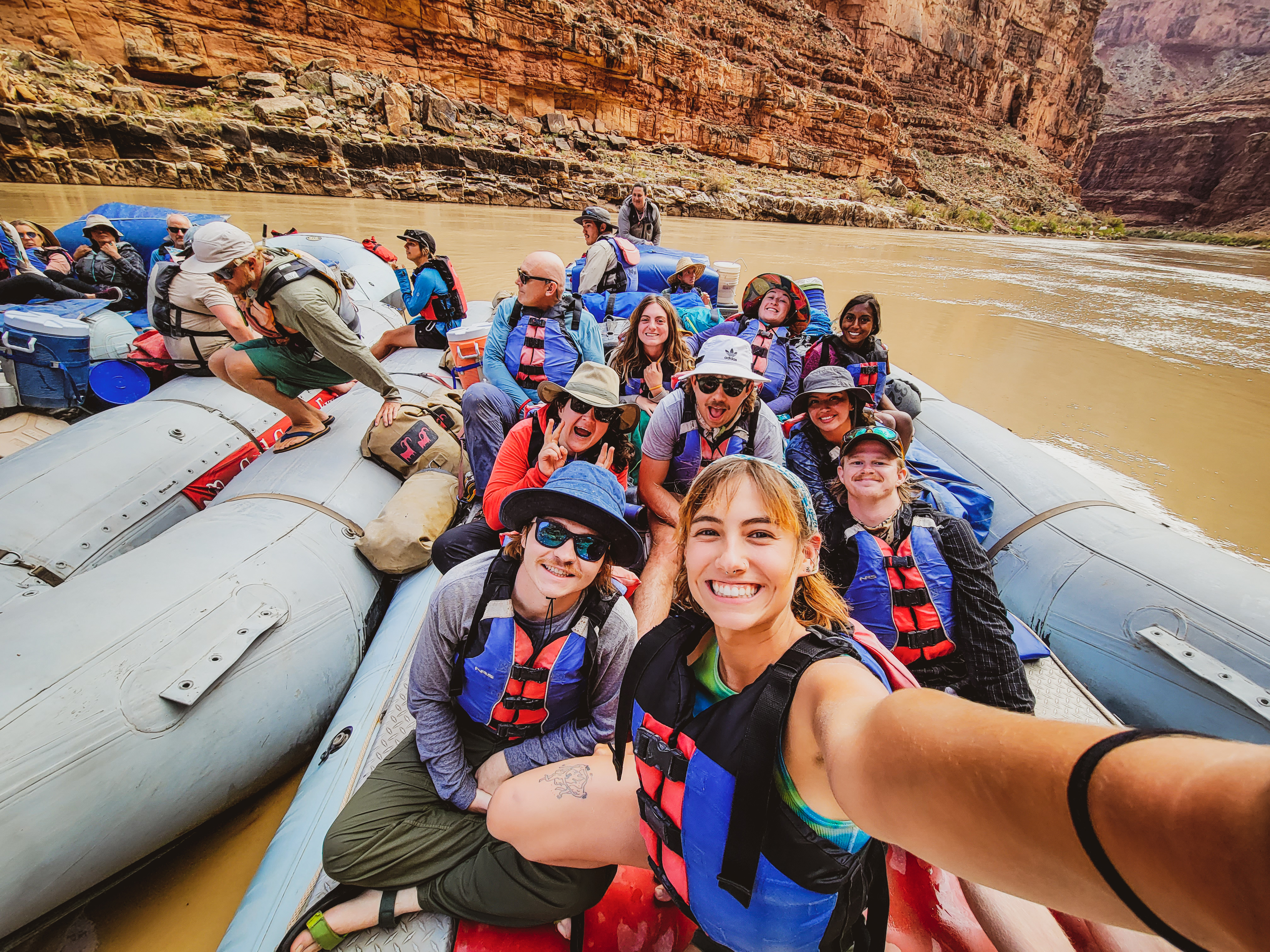 students taking a selfie wearing life jackets