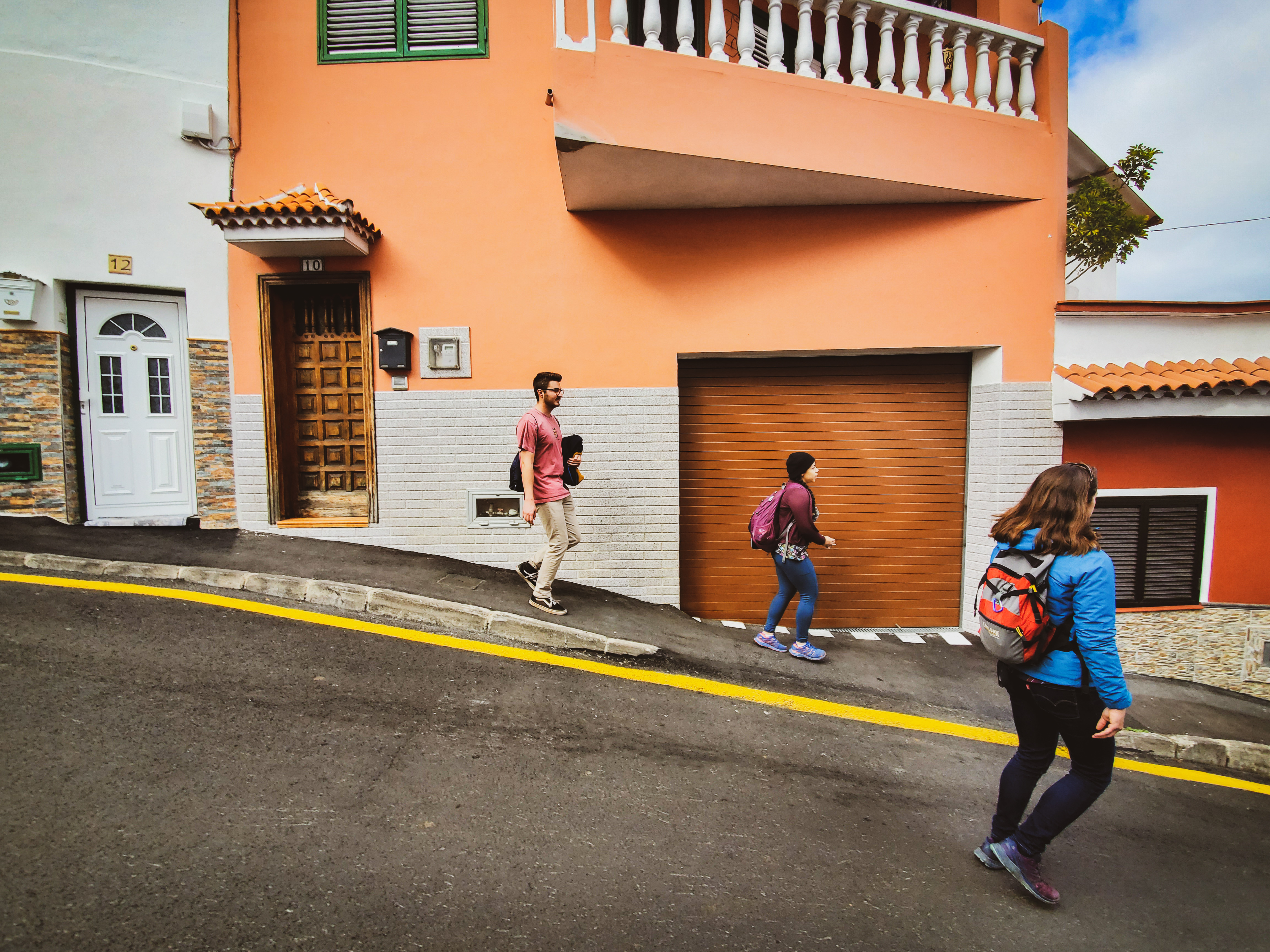 group of students hiking in steep, mountainous landscape