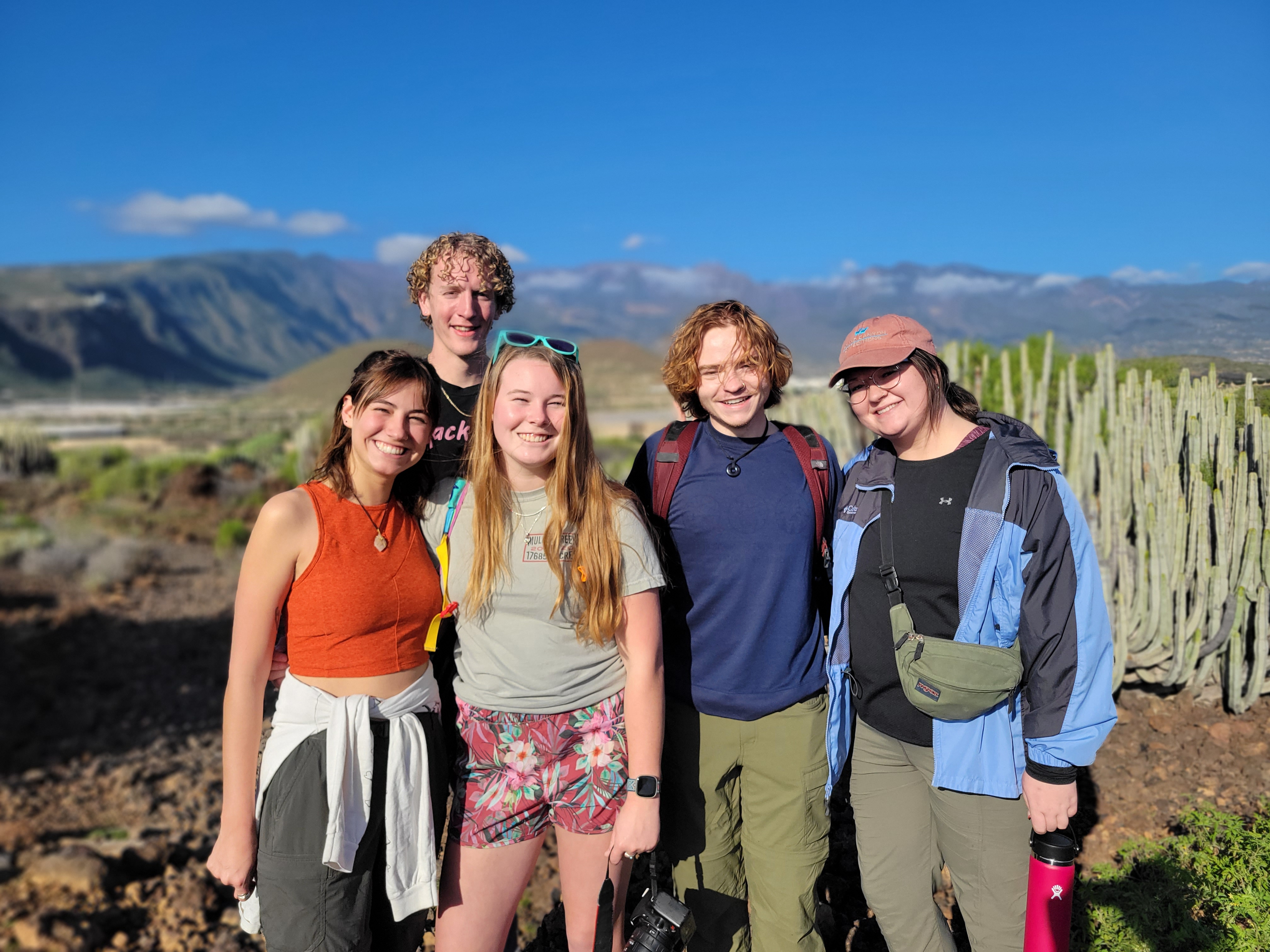 five smiling students 