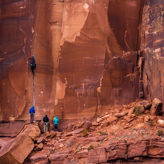 people rock climbing 