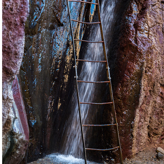ladder going up waterfall