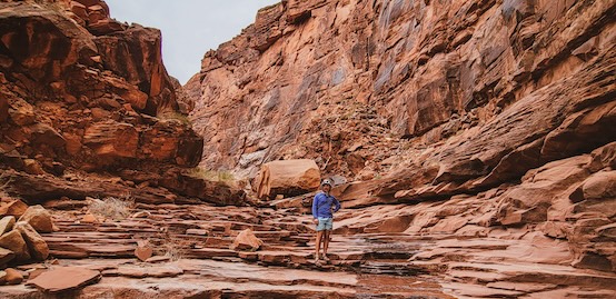 students posing on rocks 