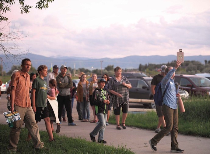 A group participates in a bat walk in Sheridan, Wyoming