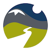 Circular green and blue Haub School logo with a path leading towards a mountain