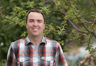 A headshot of Drew Bennett