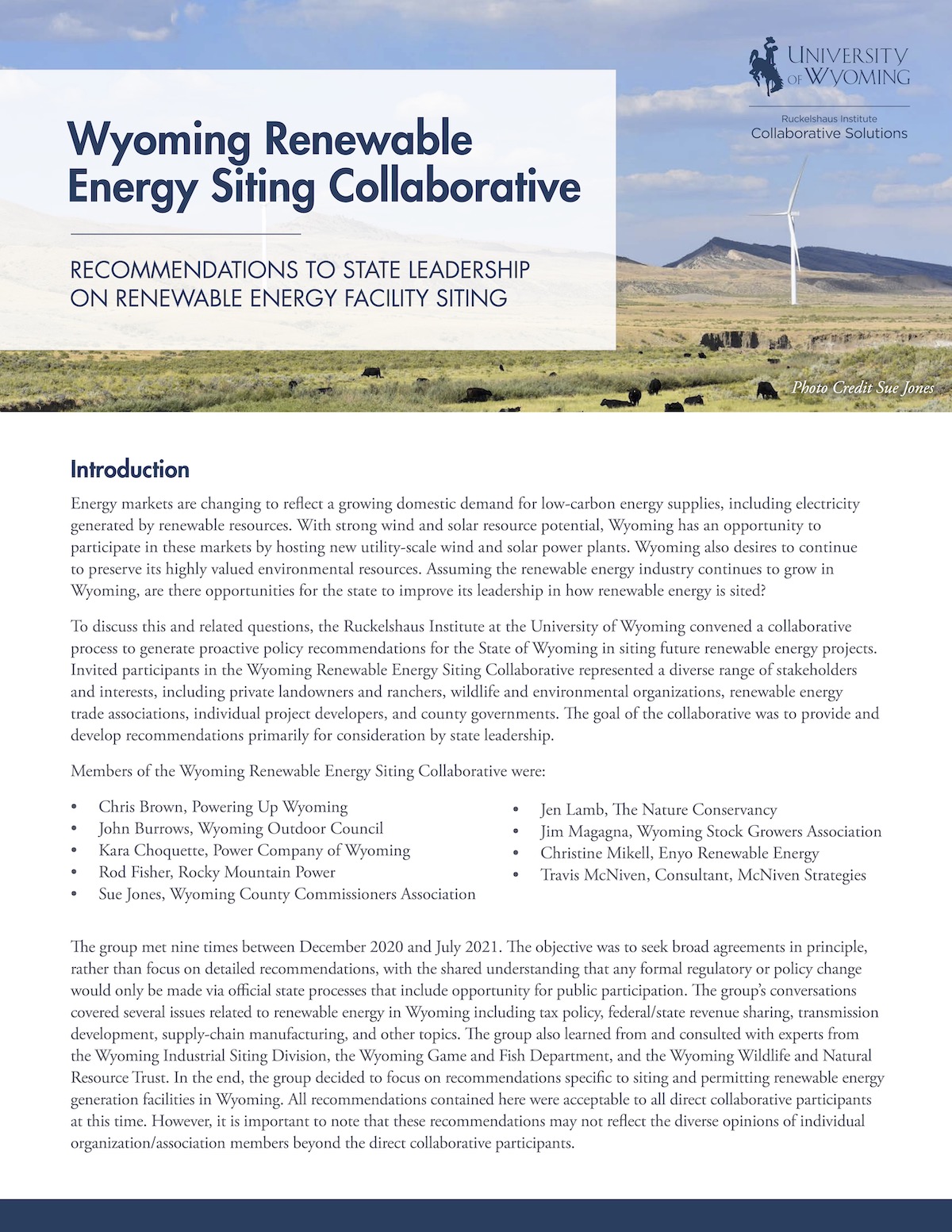 Cover of Wyoming Renewable Energy Siting Collaborative report with image of cows grazing near wind turbines.