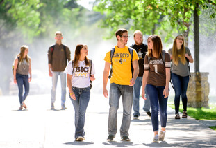 Photo of students walking on campus