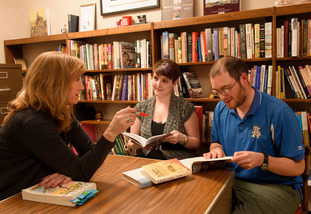 Photo of students working with Professor Laegreid