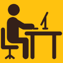decorative icon image of a figure sitting at a computer desk