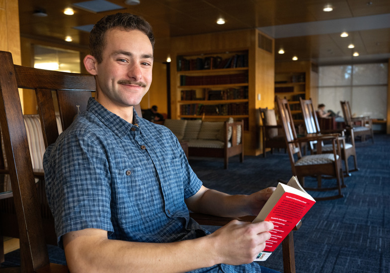 student reading a book