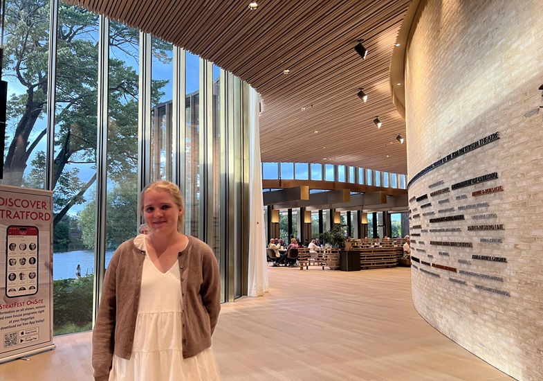 Annalise Gade standing in front of a hallway.