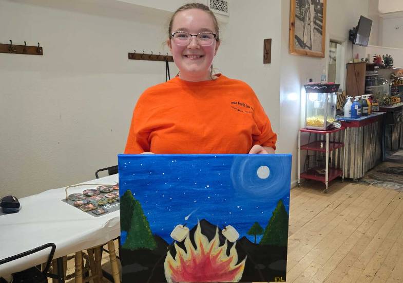 Delenn Layher with painting