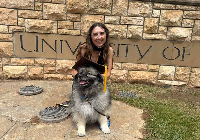 Makayla Kocher graduation photo with dog