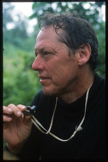 Ken Sims headshot in forest