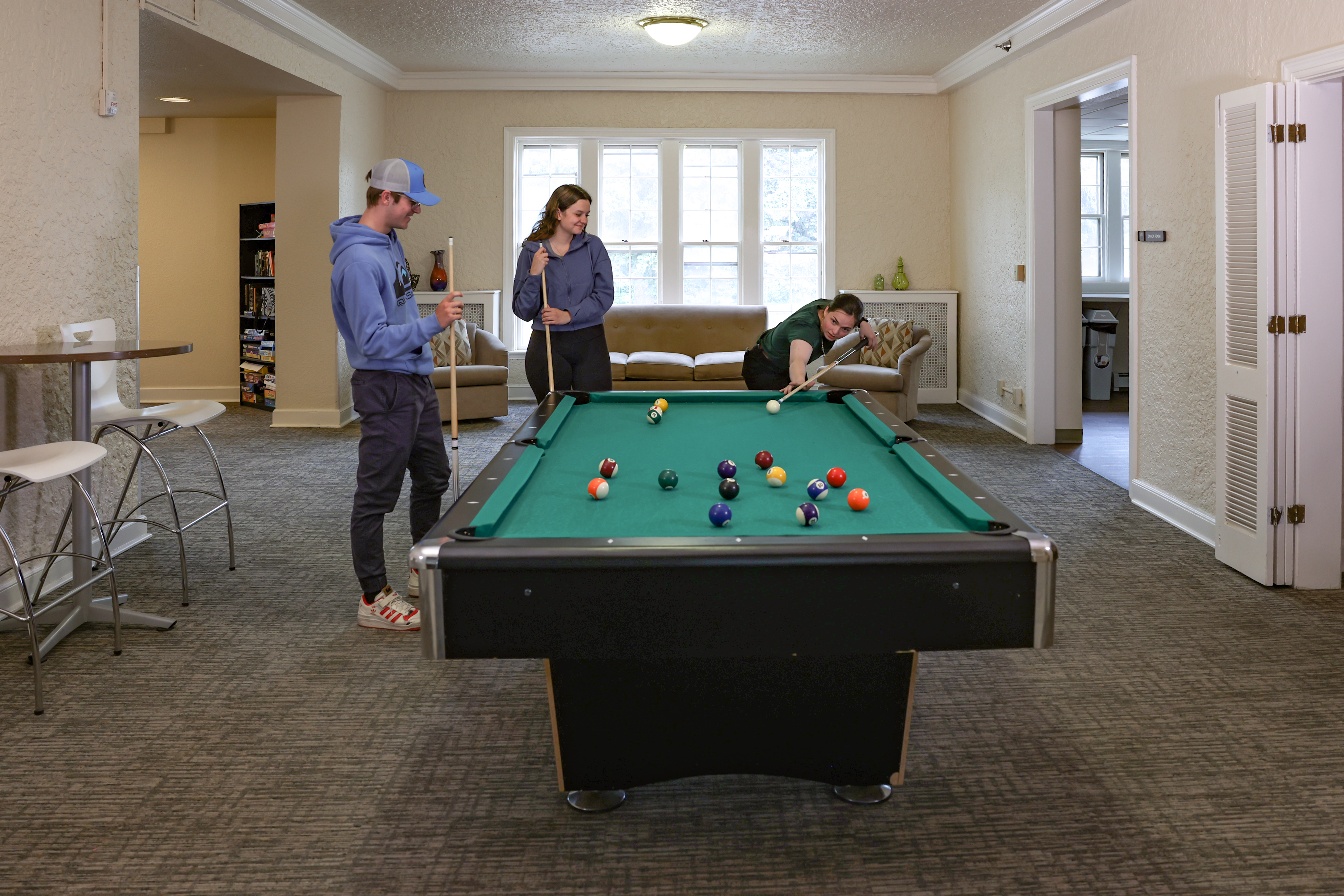 Group playing pool in Tobin House