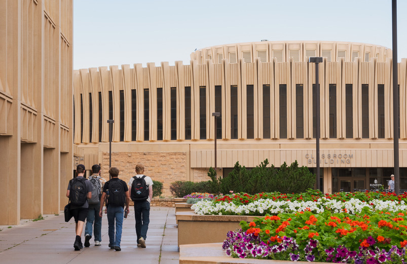 Group of students walking towards the Classroom Building
