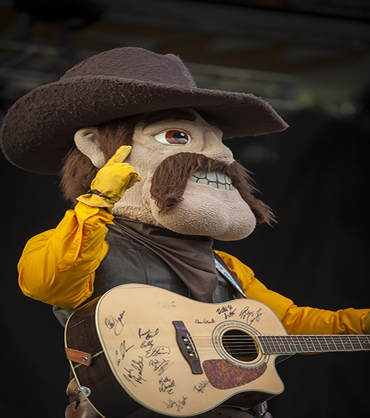 Pistol Pete with guitar