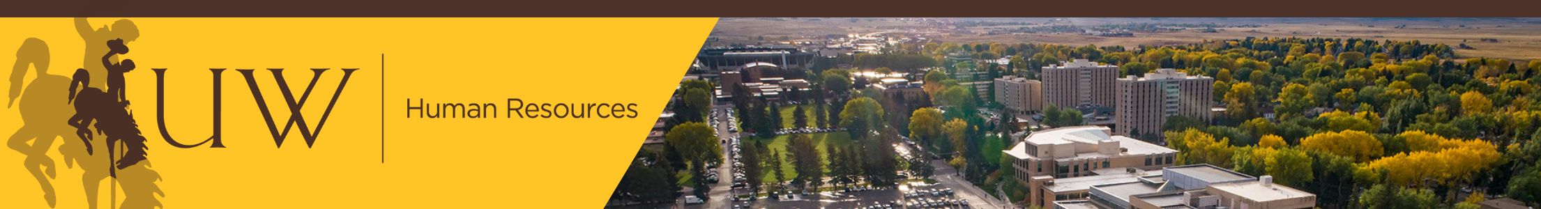 UW bucking horse logo and aerial view of campus