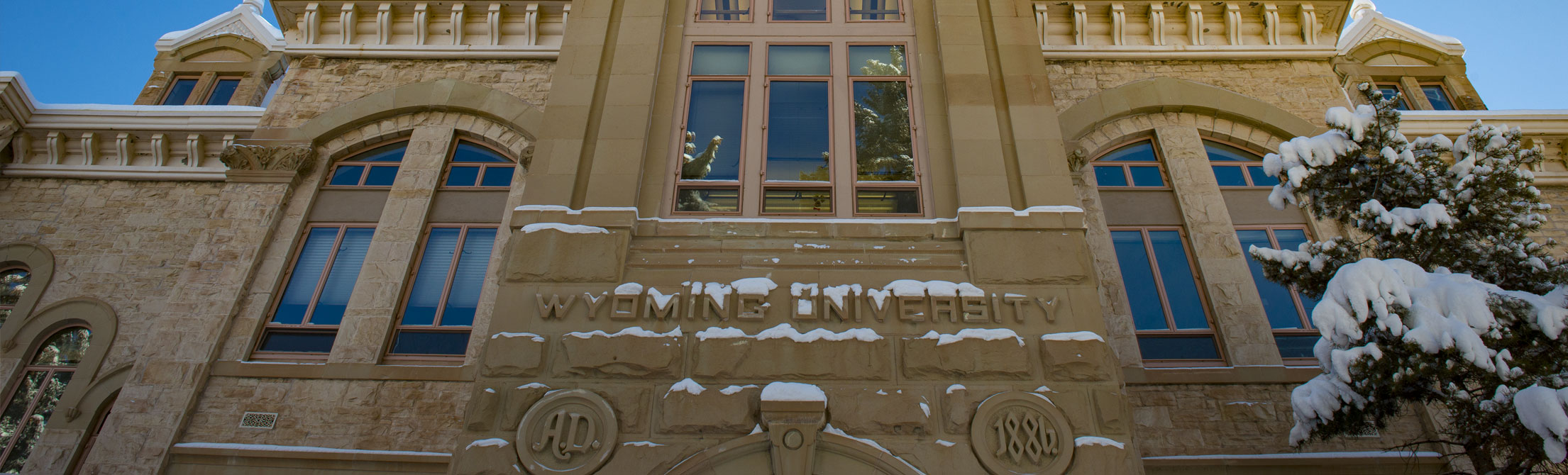 University of Wyoming sign on a stone building