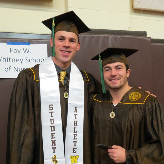 Two College of Health Sciences graduates on graduation day