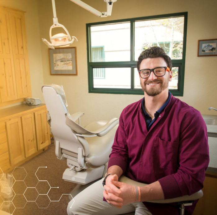 person in a dental exam room.