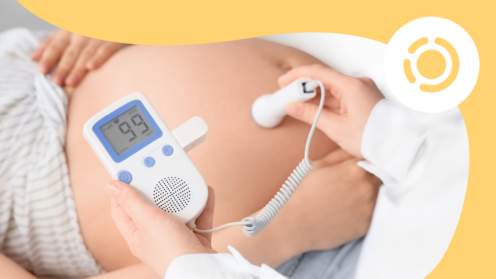 A zoomed in photo of a fetal Doppler checking the baby's heartbeat.
