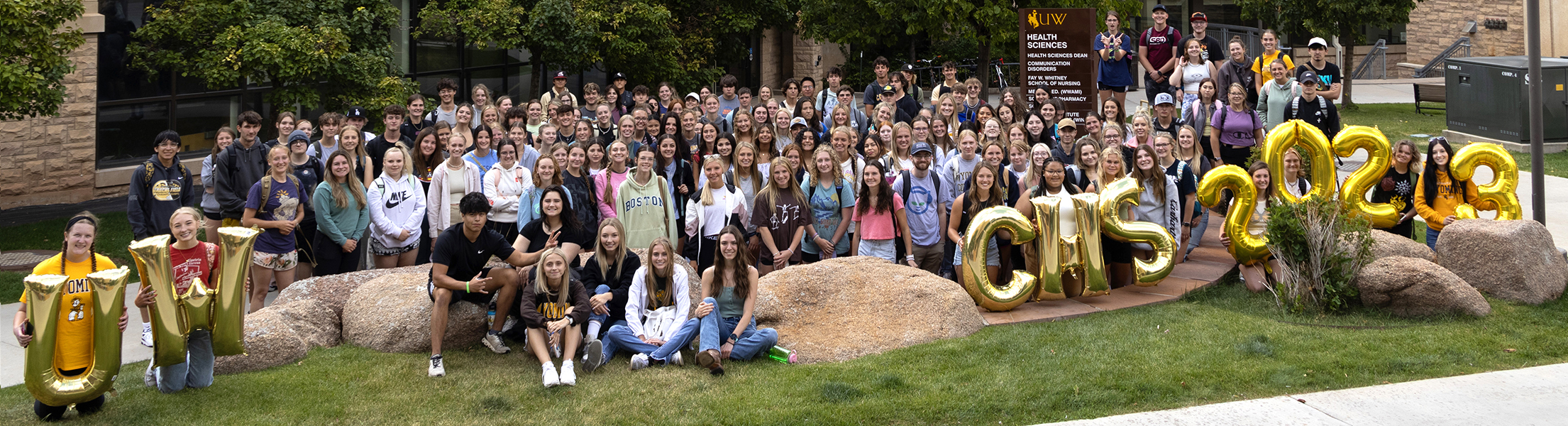 A group of students outside of the CHS building. 