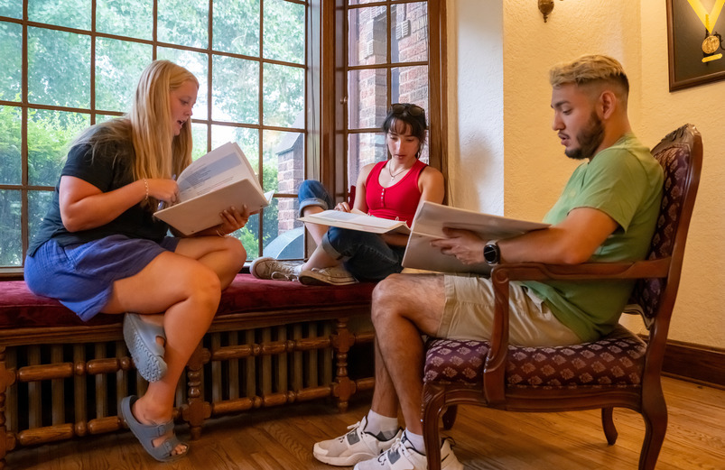 HSI PCs prepping for camp together in the Guthrie House.