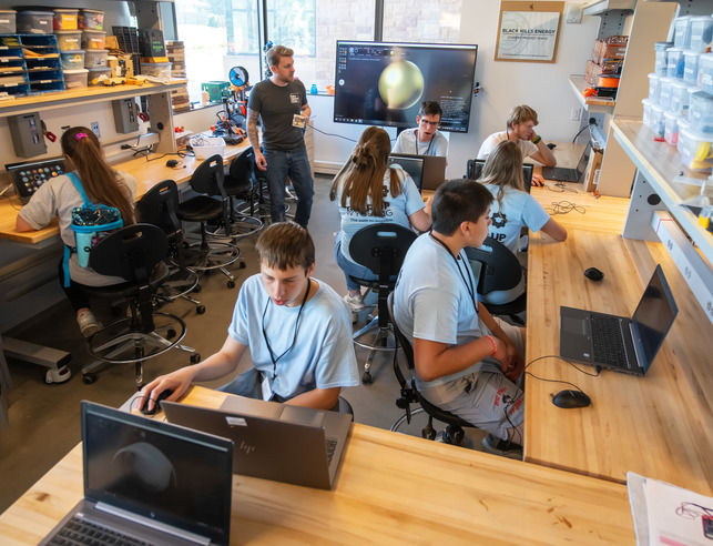 Students working on computer programming.