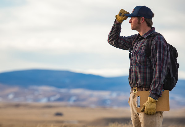 photo of student looking out over the Wyoming plains