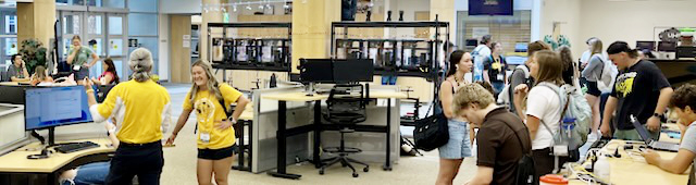 Walk-in assistants greeting people attending an event in the ITC atrium