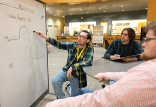 A UW student at the STEP center tutors other UW students. 