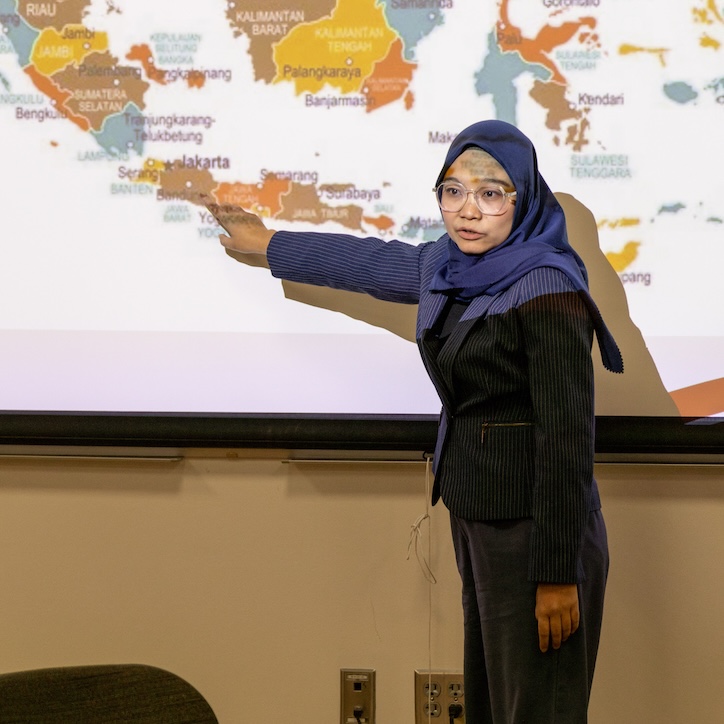 Indonesian scholar giving presentation